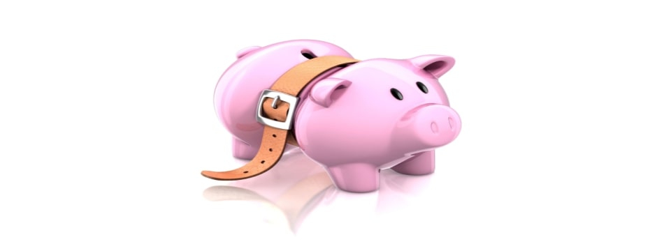 Financial concept piggy bank and belt